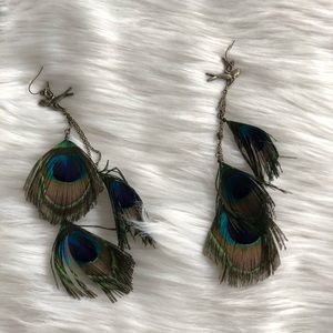 Peacock feather earrings with swallow bird detail